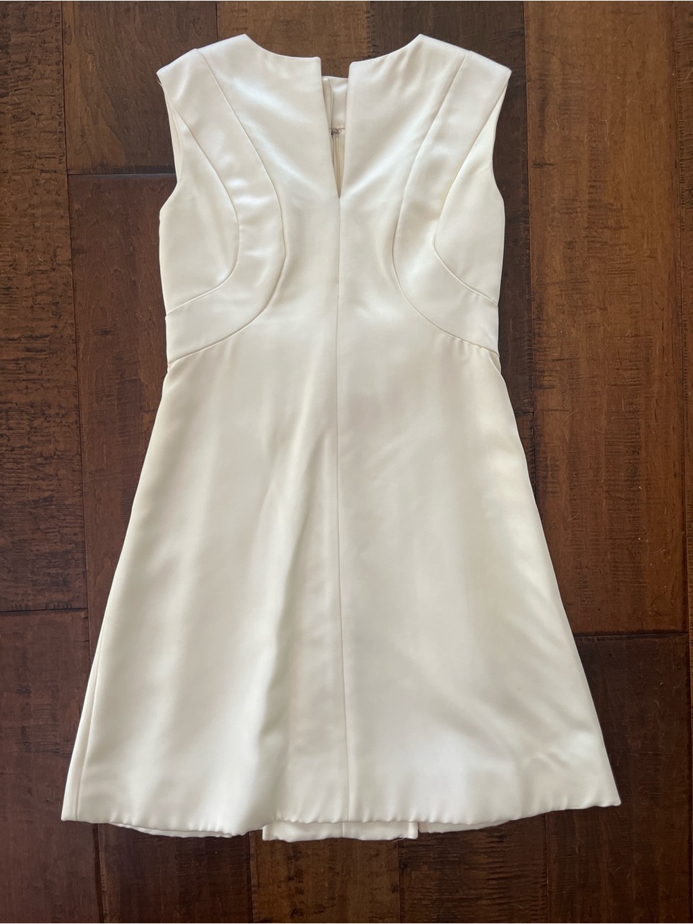 Vintage 1960’s mod A-line white mini cocktail dress with box pleats